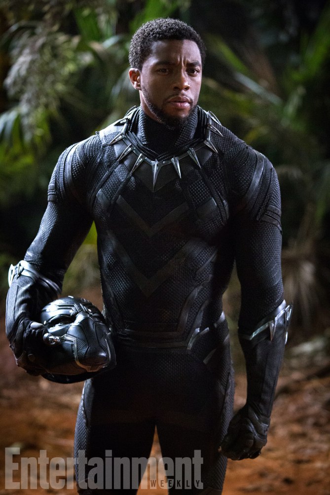 Chadwick Boseman Holding Helmet Black Panther