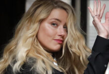 Amber Heard Waving
