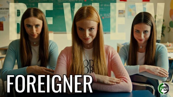 Video Movie Review: FOREIGNER (2025): Its Sharpest Cultural Satire Survives an Underdeveloped Finale